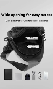 Detail showing internal large capacity main pocket and zipper compartment of black chest bag