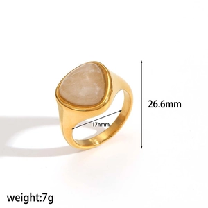 Detail of a gold stainless steel ring with a clear zircon stone and product dimensions