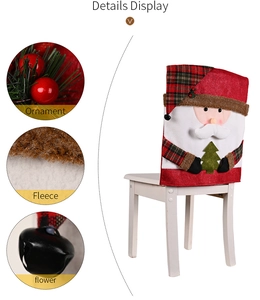 Detail display of Christmas chair cover showing plush fleece fabric and festive ornaments