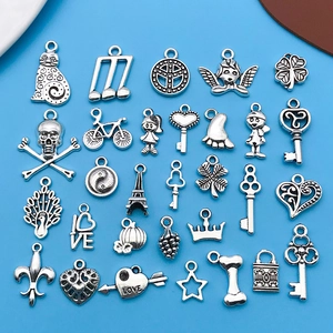 Set of 29 vintage silver charms including Eiffel Tower, heart and music notes for DIY jewelry