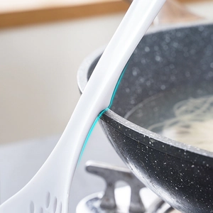 White long-handled kitchen skimmer spoon with pot-hook design for noodles and dumplings