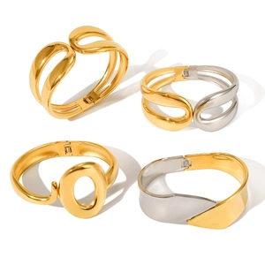 Minimalist stainless steel spring open bangles in gold and silver two-tone finishes