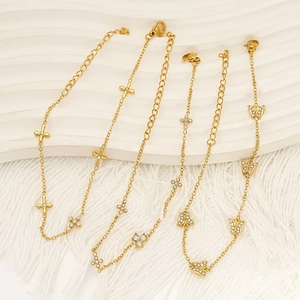 Luxurious gold stainless steel bracelets with zircon heart, clover, and butterfly charms