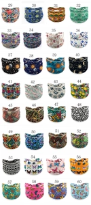 Detail showcasing 32 varied African floral and geometric print elastic yoga headbands