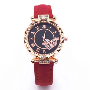 Elegant rose gold women's watch with red leather strap and sparkling heart dial