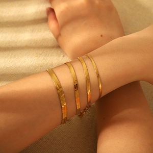 Flat 18K gold plated stainless steel herringbone chain bracelets in four widths for women