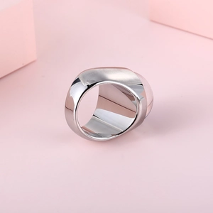 Polished silver stainless steel thick band ring with a modern minimalist wide surface