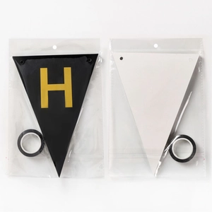 Gold foil Happy Birthday bunting banner with black triangle flags and hanging tape