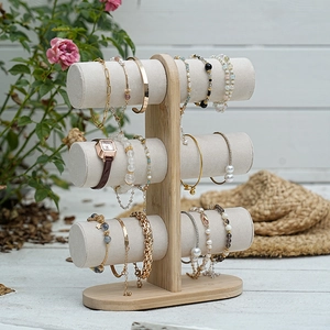 Bamboo three-tier jewelry display stand with grey velvet bars for bracelets and watches