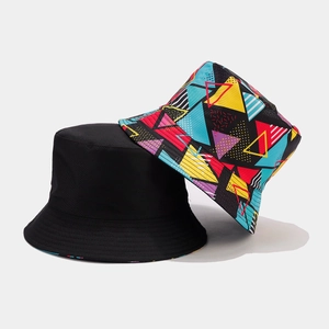 Detail of cotton bucket hat featuring colorful geometric pop art print and reinforced stitching