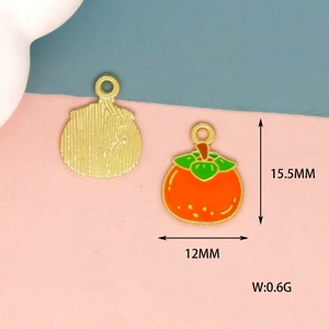 Detail of mini persimmon enamel pendant with dimensions 15.5mm x 12mm and gold plating