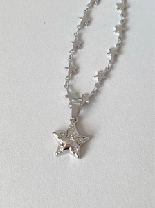 Polished silver star pendant necklace with sparkling crystals and star chain links