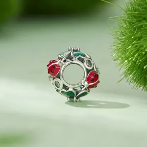S925 sterling silver four-leaf clover charm with red ladybugs and green enamel hearts