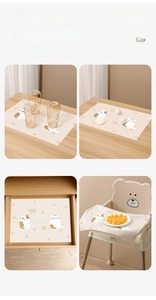Waterproof disposable table mat for kids featuring cute cartoon cats in multiple scenarios