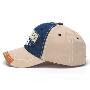Vintage blue and khaki panel baseball cap with polar bear embroidery and suede brim detail