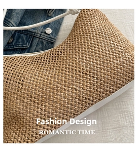 Close-up of handmade woven straw tote bag texture with white leather trim and zipper