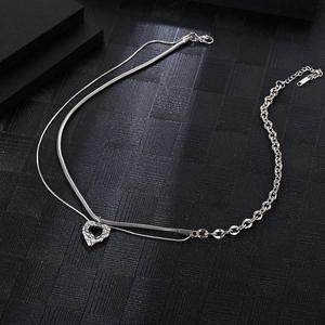 Double-layered titanium steel necklace with a black heart pendant in a hip-hop style design