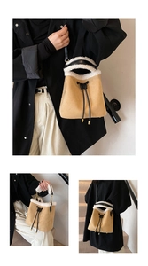 Detail of khaki suede bucket bag with white faux shearling trim and drawstring closure
