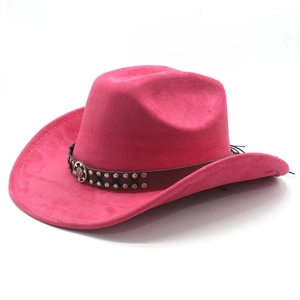 Hot pink faux suede cowboy hat featuring a leather band with metal rivets and badge