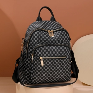Fashionable waterproof large capacity backpack with geometric pattern and gold zippers
