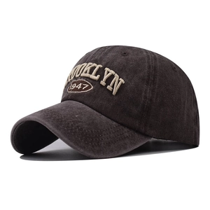 Close-up of Brooklyn 1947 3D embroidery on dark gray washed cotton baseball cap