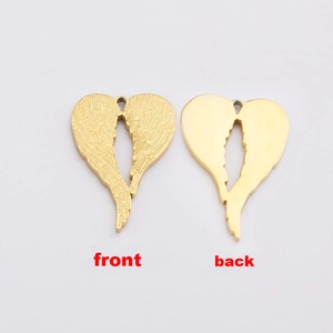 Golden stainless steel heart angel wing charm pendant showing front and back views