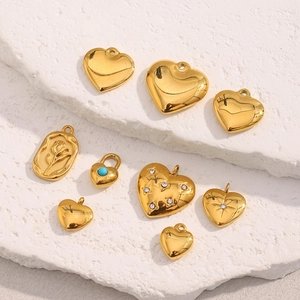 Selection of 18K gold plated heart pendants with turquoise and floral relief details