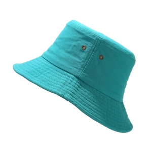 Minimalist turquoise cotton bucket hat with breathable metal eyelets and stitched brim