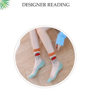 Sheer mid-calf socks with sweet watermelon pattern and vibrant orange ribbed cuffs