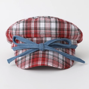 British style newsboy hat with red and white plaid pattern and blue denim bow accent