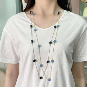 Long sweater necklace with colorful square-cut crystal gems in gold and silver finish