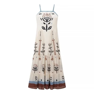 Bohemian floral maxi dress with spaghetti straps and white geometric patterns
