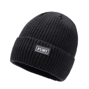 Men's winter ribbed knit beanie in black with warm thick lining and FUMY patch