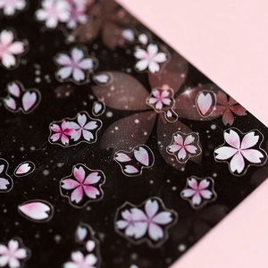 5D cherry blossom nail stickers with matte pink petals and textured black accents