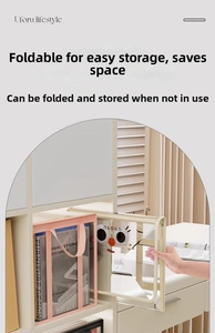 Close-up of foldable transparent storage bins with handles for organizing books