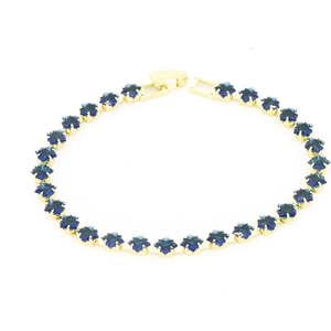 18k gold tennis bracelet featuring sparkling blue star-shaped zircon stones on white background