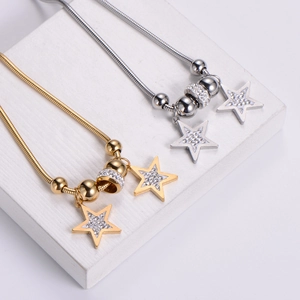 Star pendant necklace with rhinestones and snake chain in gold and silver finish