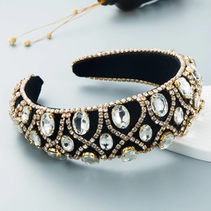 Padded baroque headband featuring sparkling crystals and gold mesh on black velvet base