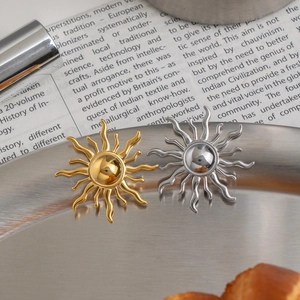 Polished sun-shaped stainless steel stud earrings in 18K gold and silver finishes