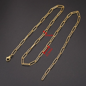 Polished gold paperclip chain link necklace 11.5mm length on black background