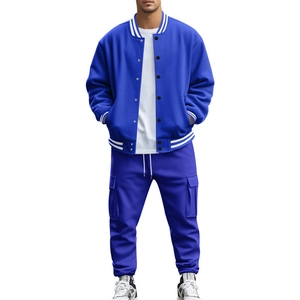 Detail of blue men's baseball jacket and cargo jogger pants sports tracksuit set