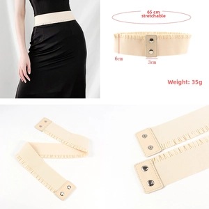 Detail of cream elastic waist belt with ruffles and silver double snap buckle