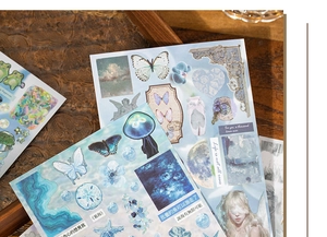 Detail of vintage blue and purple decorative stickers with butterfly and ocean motifs