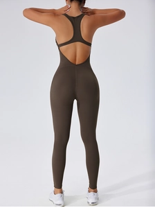 Detail of cross-back open design on deep brown high-elasticity compression yoga bodysuit