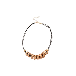 Minimalist necklace with black twisted cords and gold circular pendant on white backdrop