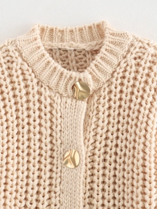 Chunky knit crewneck cardigan in beige with textured weave and gold buttons