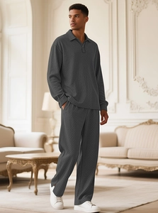 Detail of dark grey waffle texture knit polo set for men in elegant indoor setting