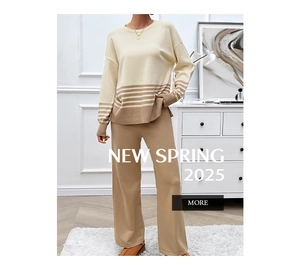 Close-up of the knitted texture and striped cuffs on a two-piece leisure set for women