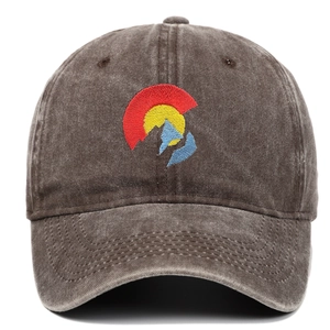 Detailed close-up of colorful embroidery and washed cotton fabric on Colorado flag cap