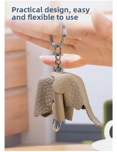 Detail of genuine leather elephant keychain showing premium stitching and metal ring